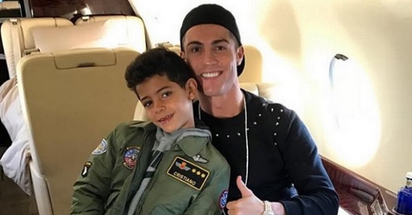 WOW!! Cristiano Ronaldo takes Cristiano Jr away for Christmas break on his private jet!